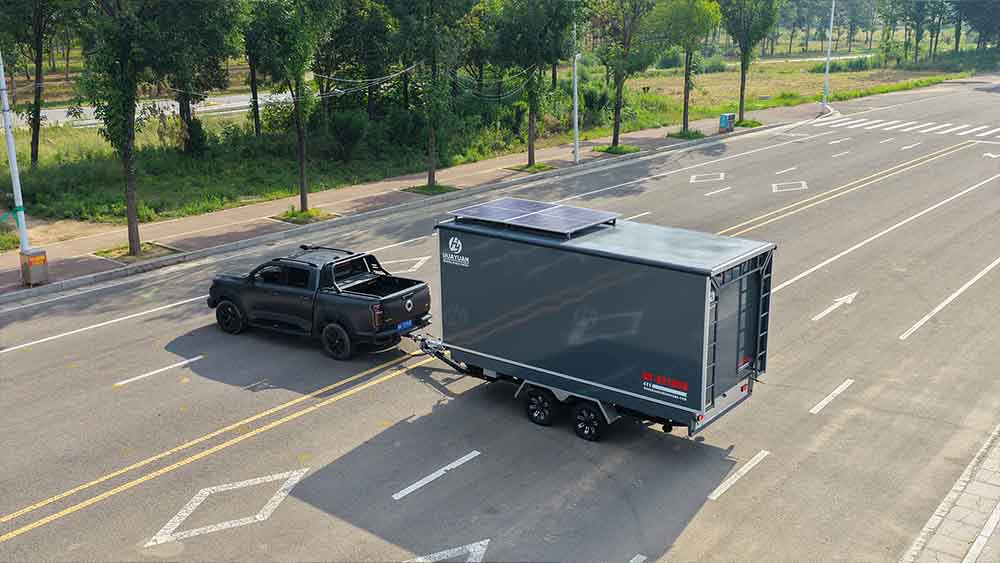 Mobile stage trailer in transport configuration